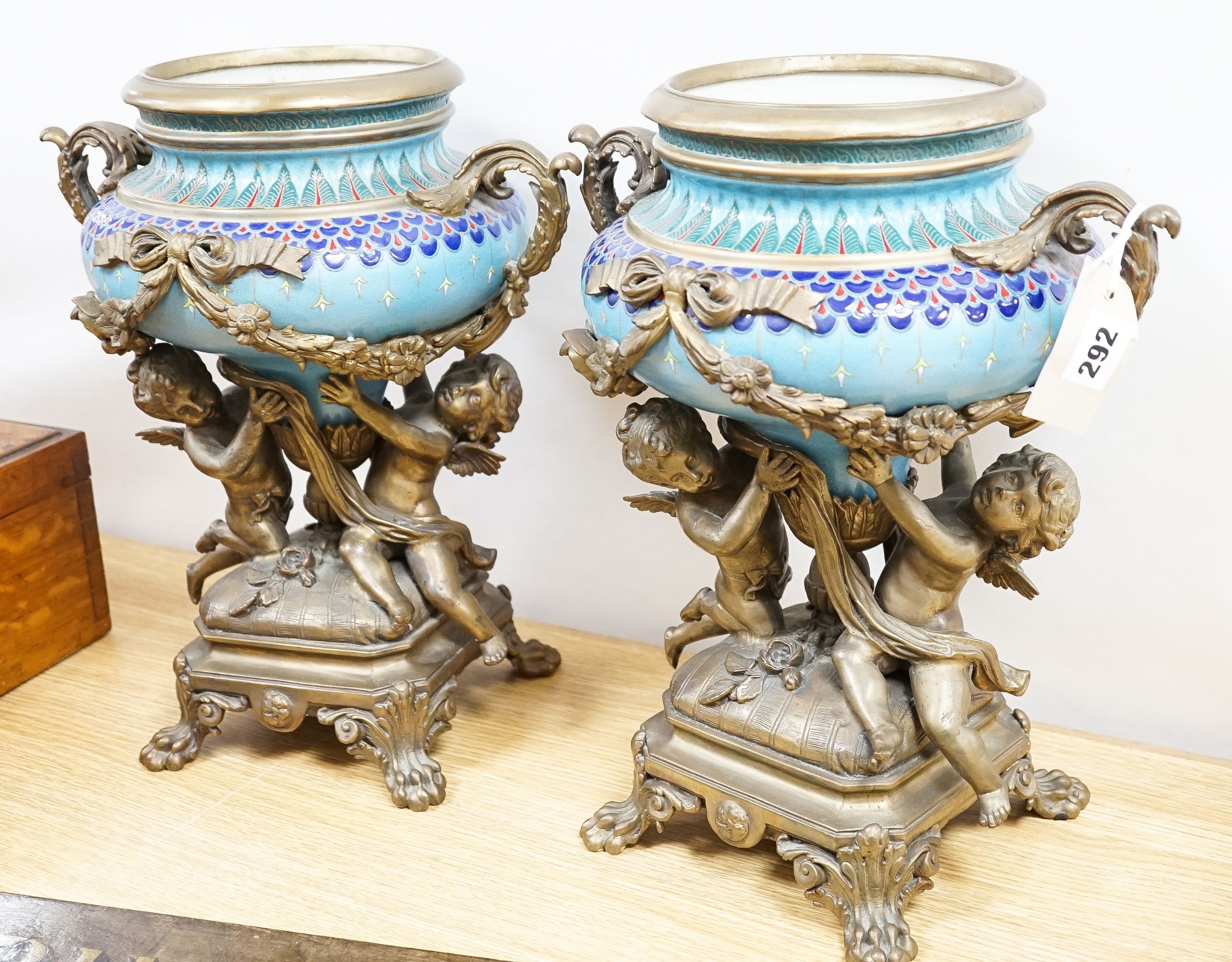 A pair of large ormolu mounted earthenware vases 39cm